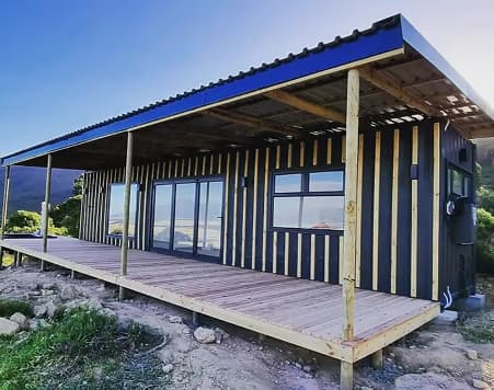 The Den built and delivered, with its full roof structure and pine deck