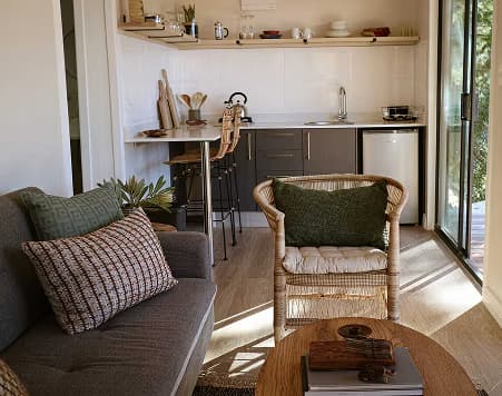 The Studio's kitchen and lounge, finished and furnished